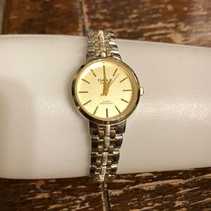Omax Silver and gold tone ladies watch quartz water resistant